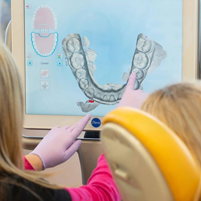 Dentist Speaking With Patient